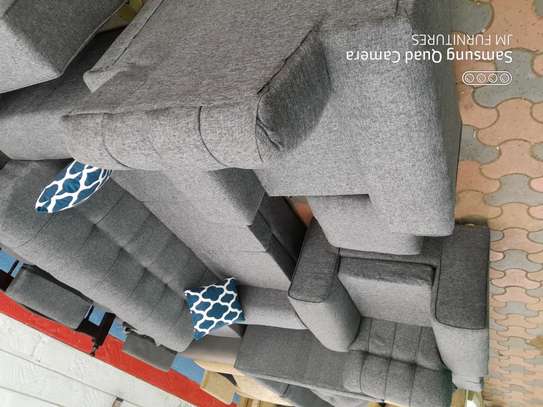 Grey five seater sofa set with footrest on sell image 1