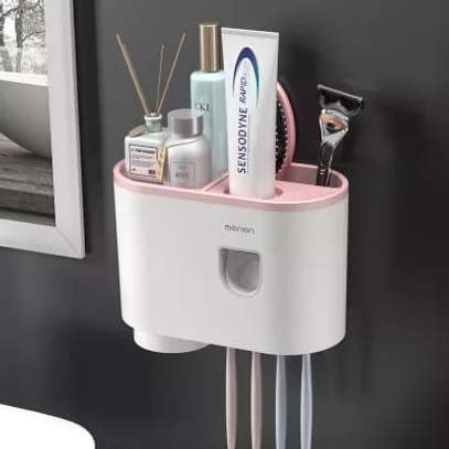 Wall mounting toothpaste dispenser available   1 cup image 1