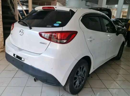 Mazda Demio Xdl pearl white image 7
