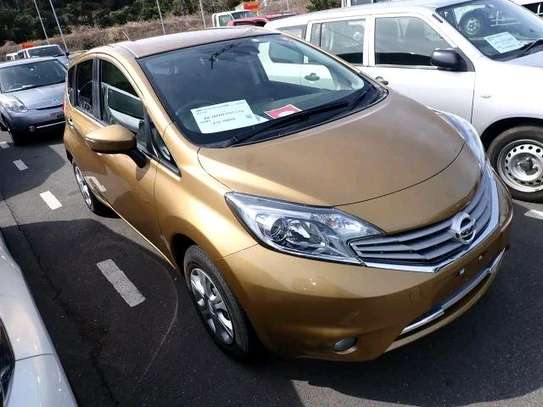 GOLD NISSAN NOTE (MKOPO ACCEPTED) image 1