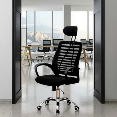 Comfort-Driven Swivel Seat with Headrest Pad image 1