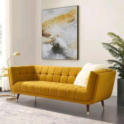 Deep tufted 3 seater sofa design image 1