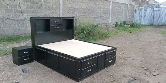 Bed with inbuilt drawers image 1