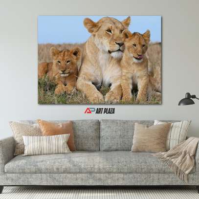 Lioness with cubs wall art image 1