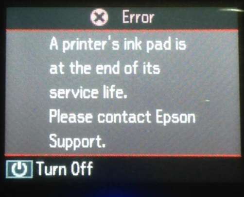 A printer's ink pad is at the end of its service life image 2
