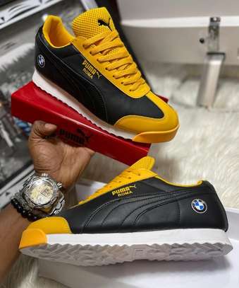 Puma roma best sale black and yellow