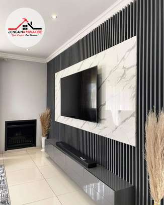 Black flutted wall panel wall unit interior design image 3