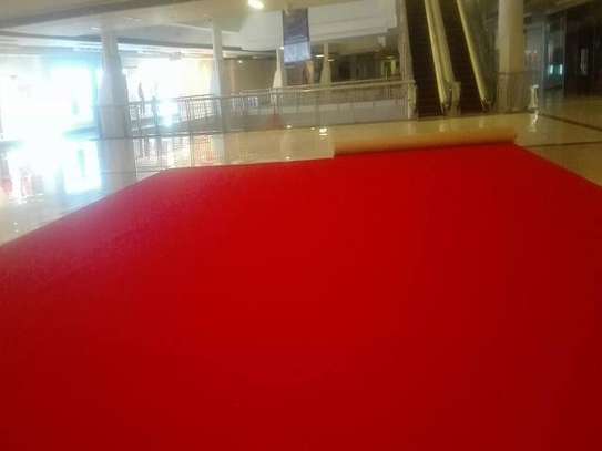 RED WALL TO WALL CARPET. image 2
