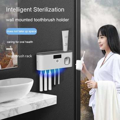 Electric toothbrush UV sterilization dispenser image 2