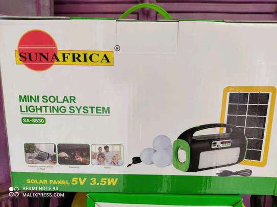 Mini solar lighting kit with FM radio image 1