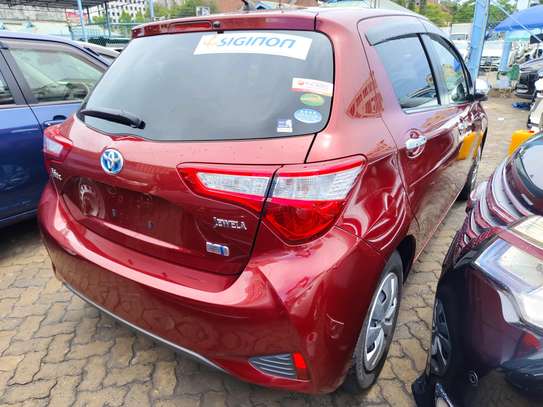 Toyota Vitz hybrid Jewela maroon 2018 image 9