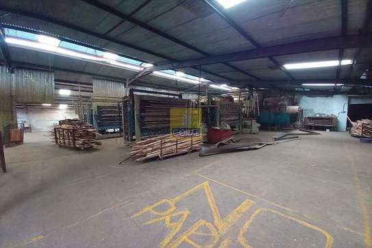 0.77 ac Warehouse with Parking at Zam image 14
