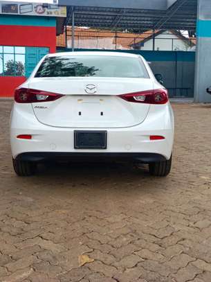 Mazda Axela white color Sedan 2019 model. image 2