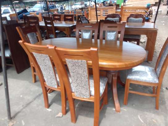 Dinning table with 6 chairs purely mahogany image 1