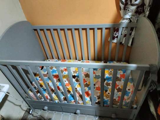Baby cot with mattress image 1