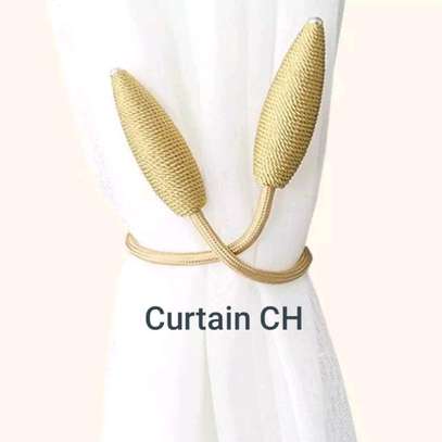 MAGNETIC CURTAIN HOLDERS image 3