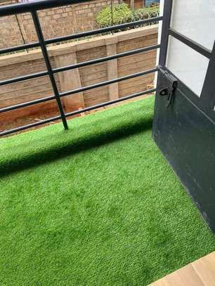 green oasis at your feet; artificial grass carpet image 3