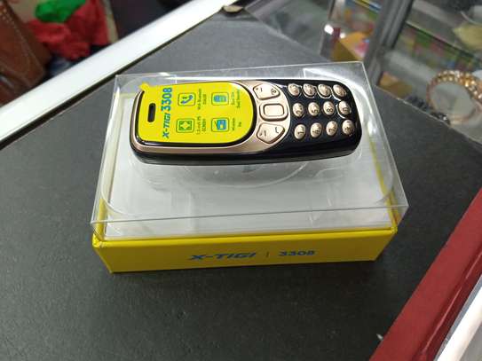 X Tigi 3308 Super Tiny phone - Dual Sim, Fm Radio, Bluetooth image 1