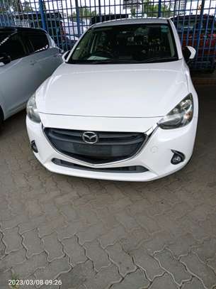 Mazda Demio petrol pearl white image 1