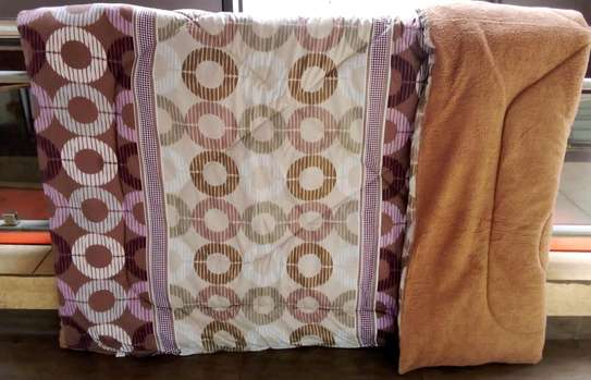 7 piece cotton/woolen duvet sets  with matching curtains. image 1