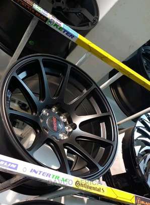 15 Inch Nissan Wingroad alloy rims brand new black image 1