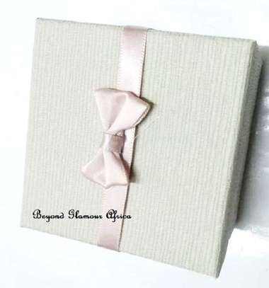 Grey cardboard gift box with pink ribbon image 1