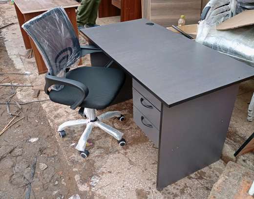 Office desk with a secretarial chair image 1