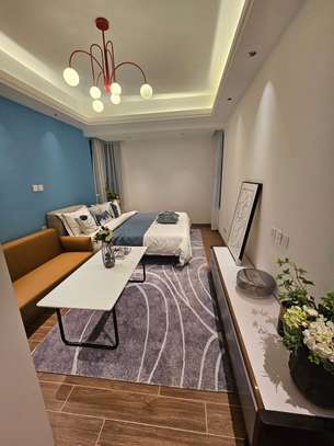 Luxury Living & Dining Room with Marble Floors image 9