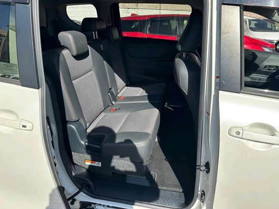 Toyota Sienta perl white color fully loaded 2019 model. image 7
