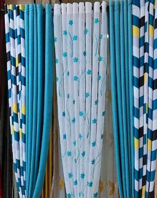 PLAIN BLUE AND PRINTED CURTAINS image 1