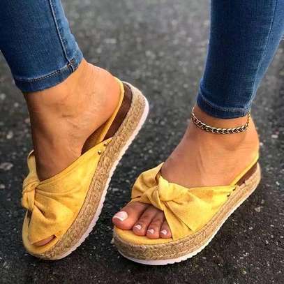Quality Yellow Bow wedge Sandles*
*Size: _37 38 39 40 41 42_*
*Price: 2000*
*Colours: 6??* image 1
