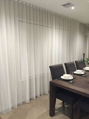 //dinning table white blinds image 1