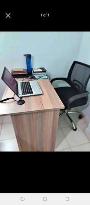 Study desk and a swivel chair image 1