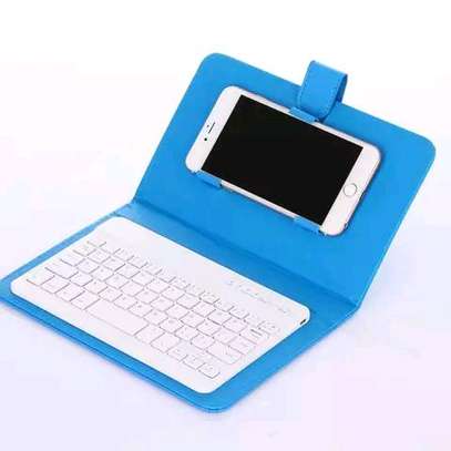 ♦️Bluetooth keyboard and cell phone leather case pouch cover image 4