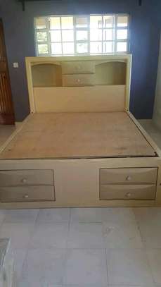 Bed with inbuilt drawers image 1