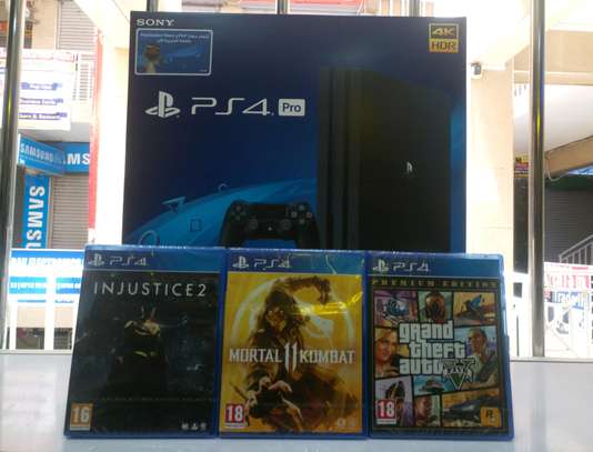 Ps4 Pro 1tb With 3 Games Injustice 2 Mk11 Gta 5 In Nairobi Pigiame