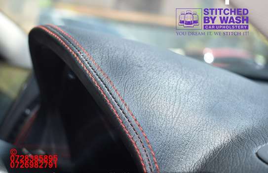 Subaru outback dashboard, steering and handbrake stitching image 2