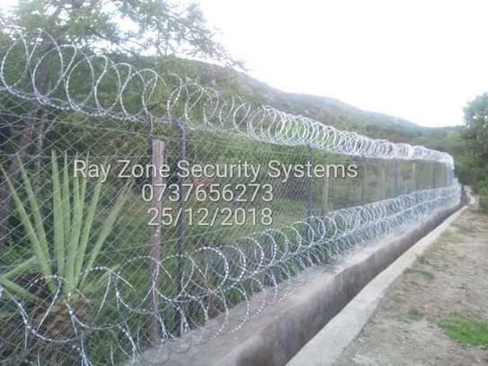 Electric Fence and Razor Wire Installation image 1