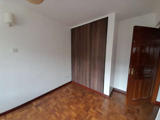 3 bedroom apartment master Ensuite with a cloakroom image 9