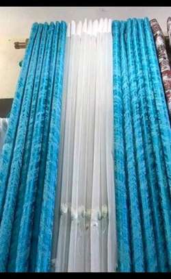 :PLAIN BLUE AND PRINTED CURTAINS image 1