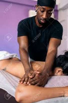 Relaxing ladies massage done by male masseur image 1