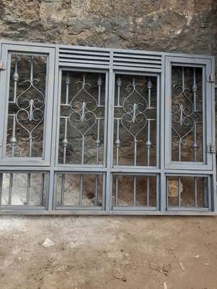 Steel windows with grills image 1