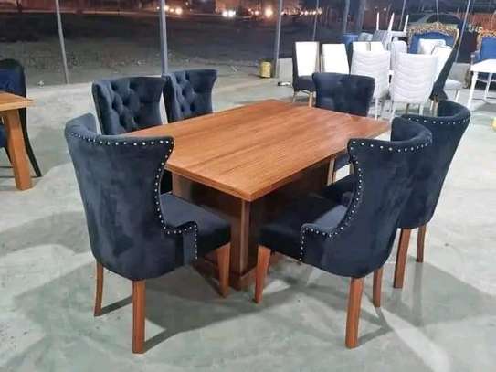Wooden dining table with 6 chairs image 1