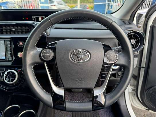 Make Toyota model Aqua white color fully loaded 2019 model. image 2