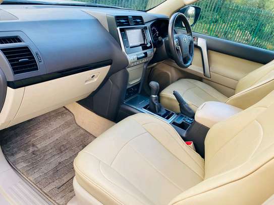 Toyota Land cruiser prodo TXL white color fully loaded image 2