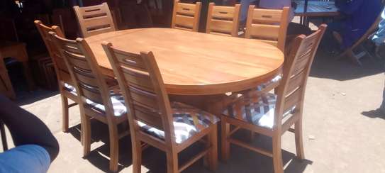 Dinning table with  8 chairs image 1