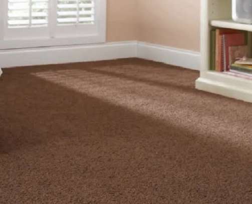 Brown wall to wall carpet image 1