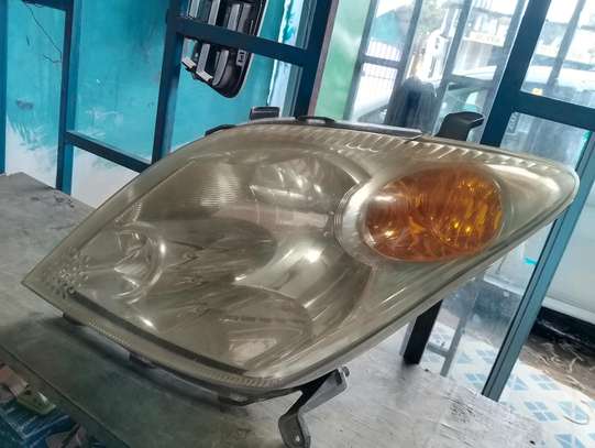 Toyota IST 2003 model lhs headlight image 2