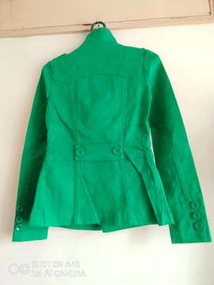Green trenchcoat + matching green earrings image 3