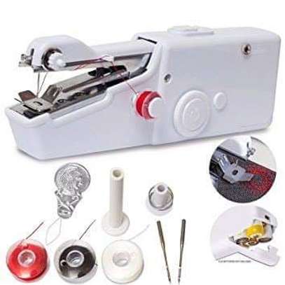 Hand sewing machine image 1